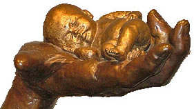 Baby-in-hand by Sculptor Teresa Yost